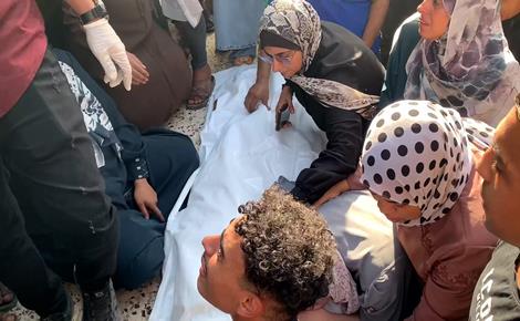 تشييع شهيدين ارتقيا بقصف مركبة بغزة